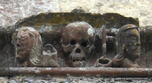 Carving at Soberton churchdepicting pail and key